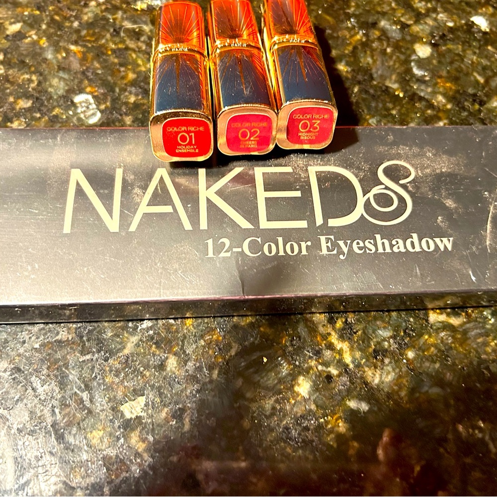 Shimmer Eye shadow and three lip sticks. NEW SEALED